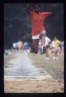 Woman competing in long jump